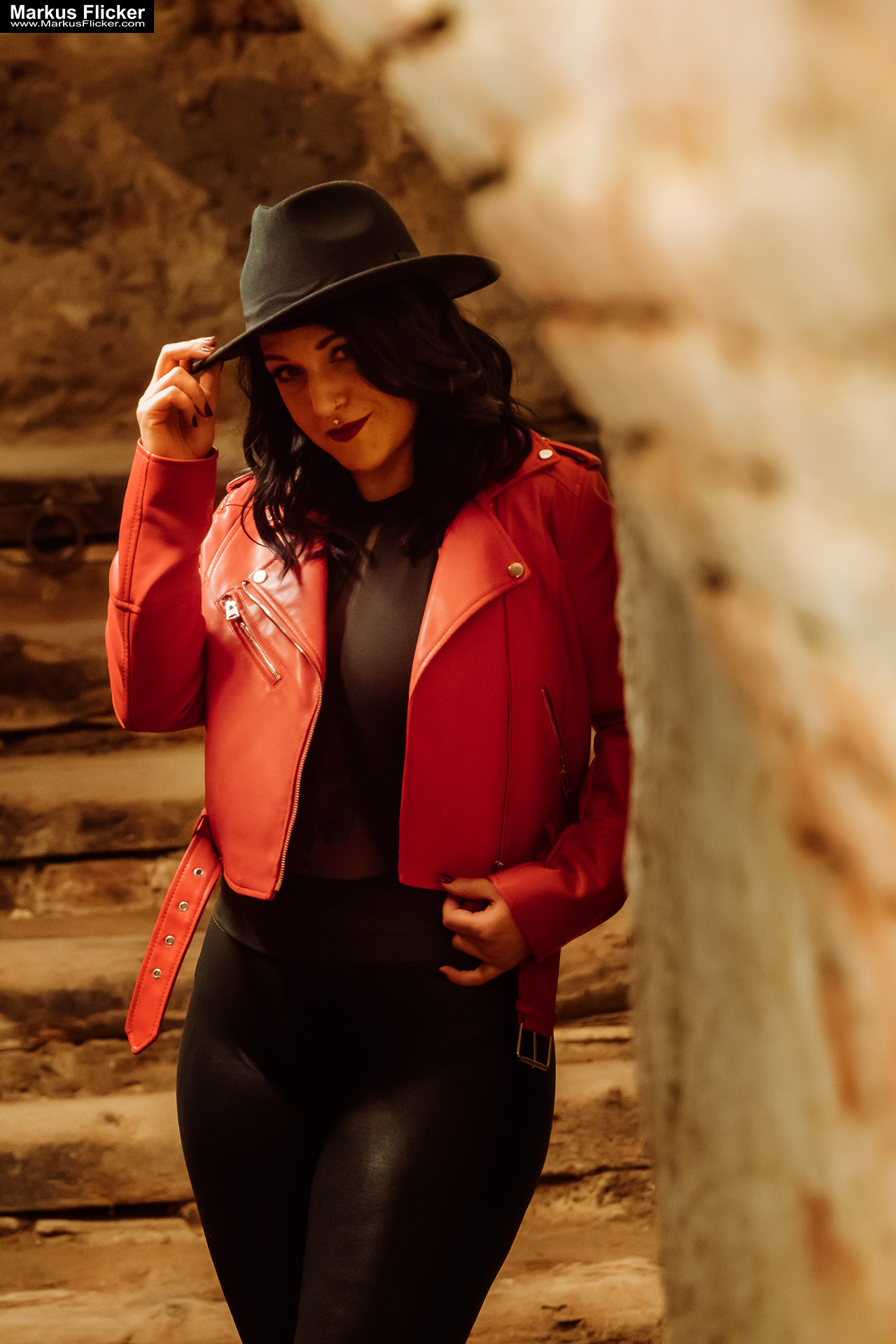 Red Jacket Underground Keller Gewölbe Portrait Photography Female Tattoo Model Elisa in Graz
