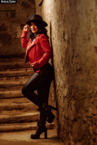 Red Jacket Underground Keller Gewölbe Portrait Photography Female Tattoo Model Elisa in Graz