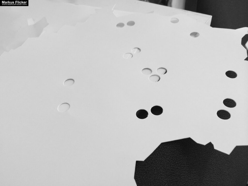 Kreative Fotomotive mit Papier durch das Spiel mit Licht und Schatten