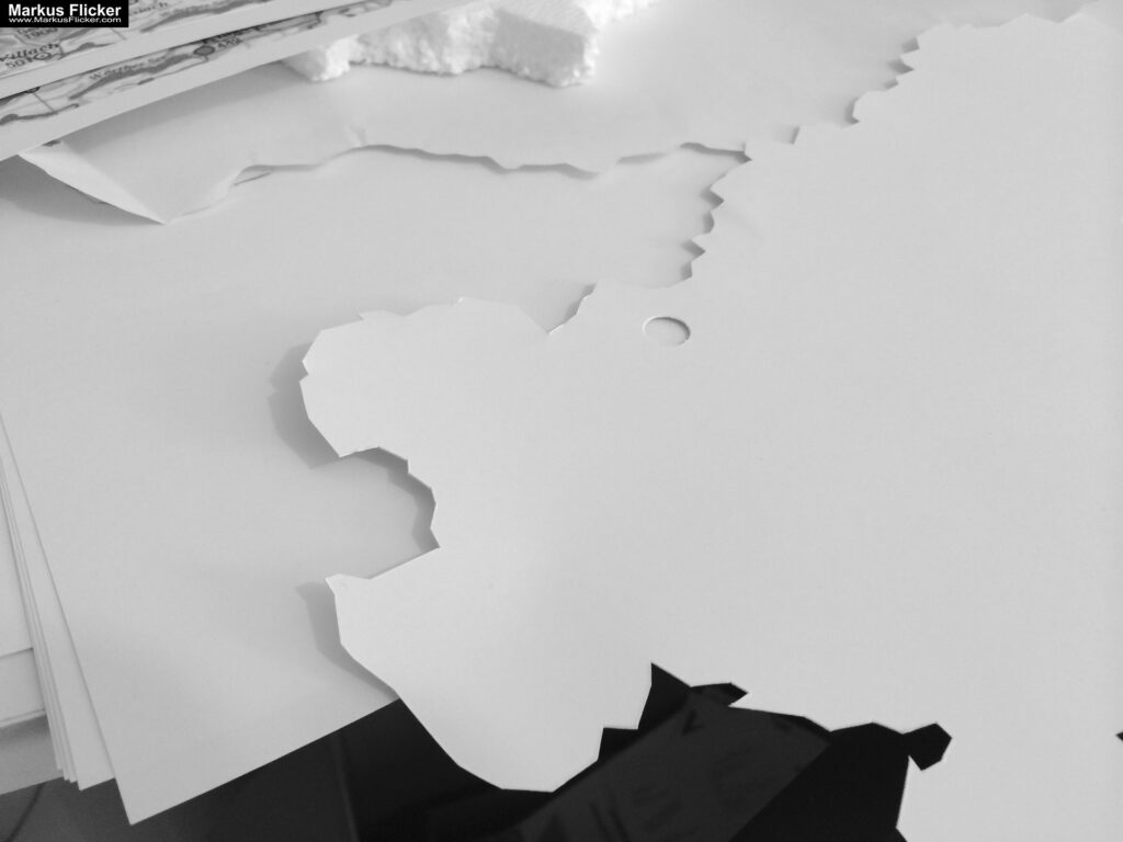 Kreative Fotomotive mit Papier durch das Spiel mit Licht und Schatten